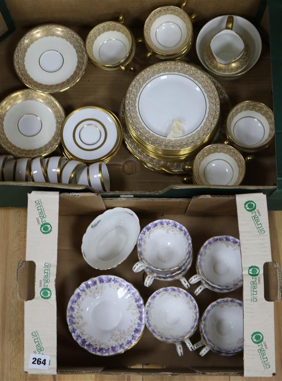 A Royal Doulton gilt tea set and another